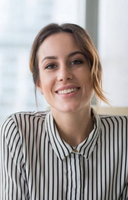 istockphoto-1129638608-612×612 Smiling businesswoman looking at camera webcam make conference business call, recording video blog, talking with client, distance job interview, e-coaching, online training concept, headshot portrait